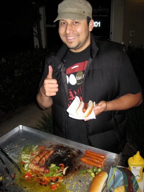 Chris, owner of Mr. Hot Bunz, at the grill
